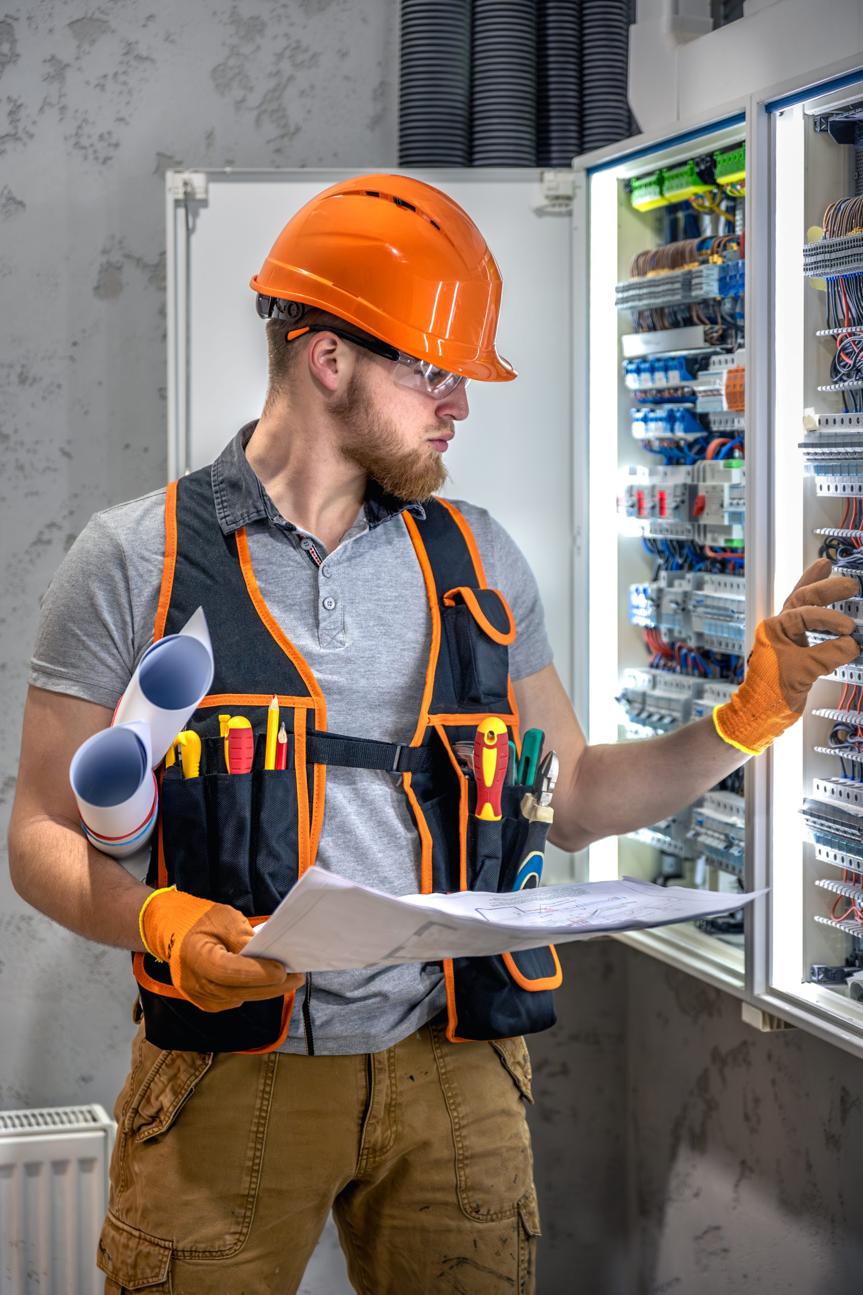 male electrician working electrical panel male electrician overalls scaled